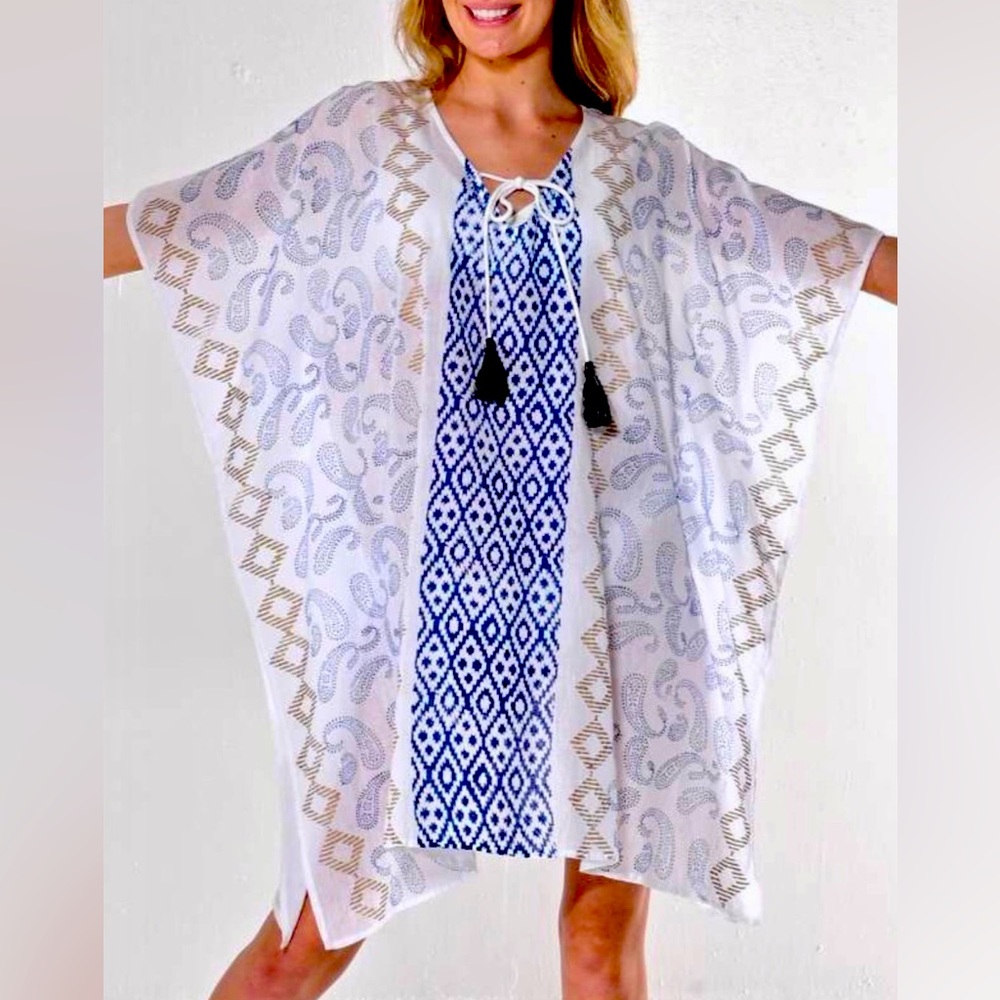White, blue and gold tunic.